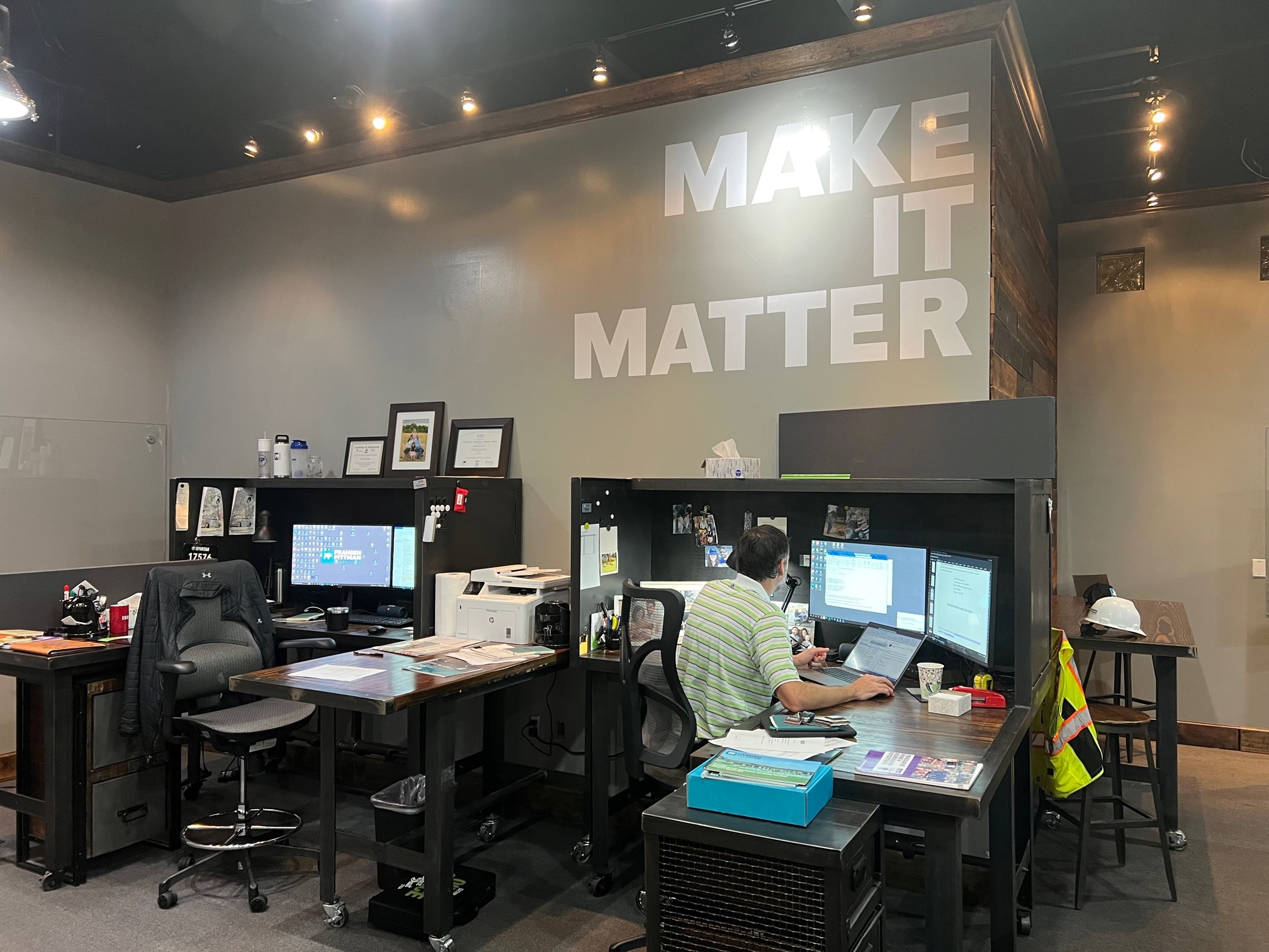 Jed Risser working in the new office at Main and Main